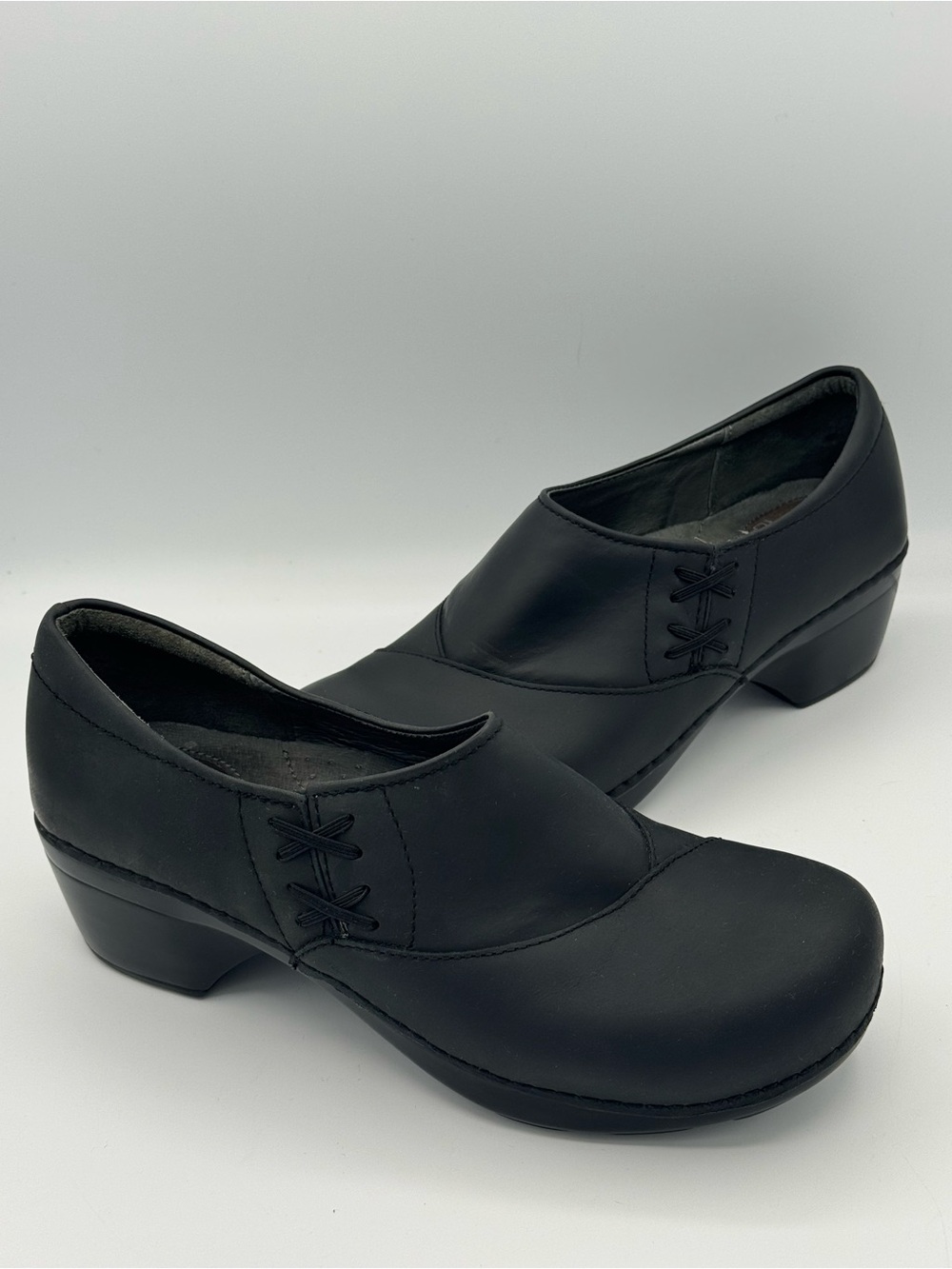 Dansko Stacie Black Full Grain Leather Clog with Criss Cross Stitch Detail